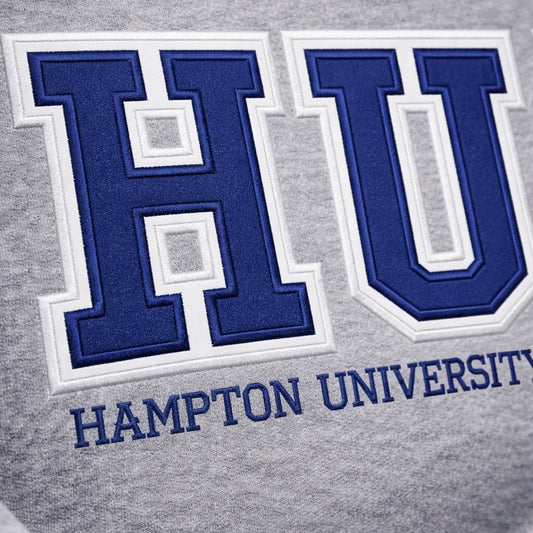 Close-up of customizable sweatshirt featuring bold gray varsity-style lettering for Hampton University.