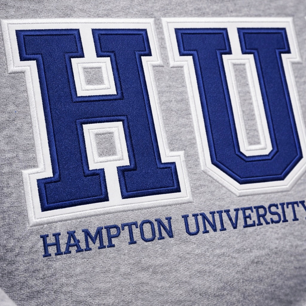 Close-up of customizable sweatshirt featuring bold gray varsity-style lettering for Hampton University.